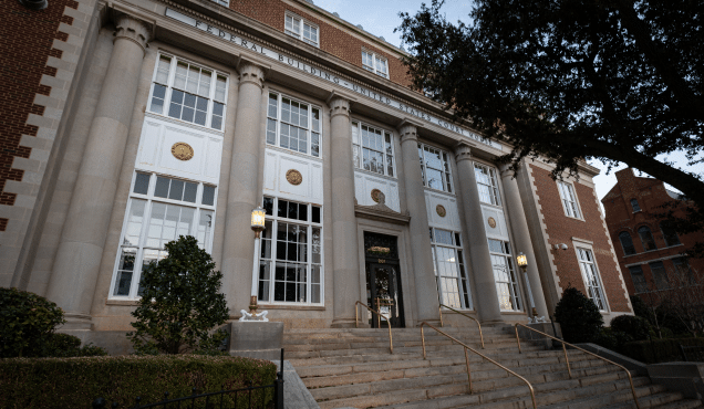 Exterior of a courthouse representing source of county-level criminal records used in insurance pre-bind screening